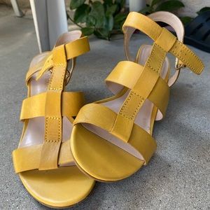 Saffron-colored Franco Sarto small wedge sandal.